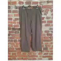 Luźne spodnie ze ściągaczem w pasie i na nogawce w kolorze brązowym
