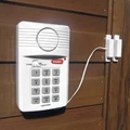 Alarm antywłamaniowy do domu garażu UNI-COM 65555 widok z przodu