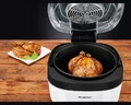 Piec halogenowy SILVERCREST® SHOM 1000 A1 6 programów automatycznych widok gotowanie kurczaka