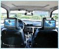 Przenośne samochodowe DVD 2 x LCD Medion divix usb widok na zagłówkach w samochodzie