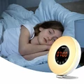 Radio z budzikiem i lampką stymulacja świtu Tasikar LED widok przy łóżku