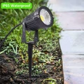 Reflektor punktowy wodoodporny zewnętrzny do ogrodu Romwish 5W 3000K LED ciepły widok na trawniku